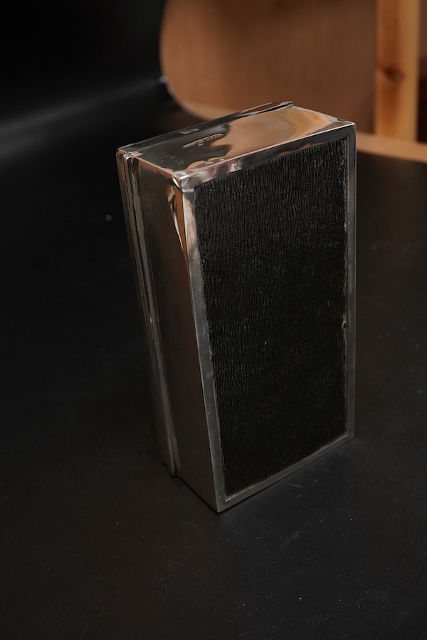 A George V part engine turned silver mounted rectangular cigarette box, with engraved inscription, J.B. Chatterley & Sons, Birmingham, 1925, 16.5cm.
